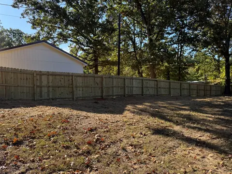 Long run of new wood privacy fence
